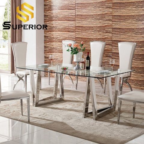 The Art of Styling a Clear Glass and Stainless Steel Dining Table